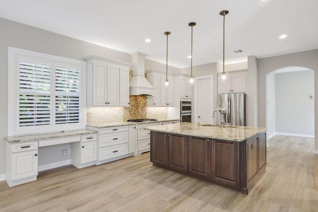 Photo of 932 Mill Creek Drive, Palm Beach Gardens, FL 33410 (MLS # R11134010)