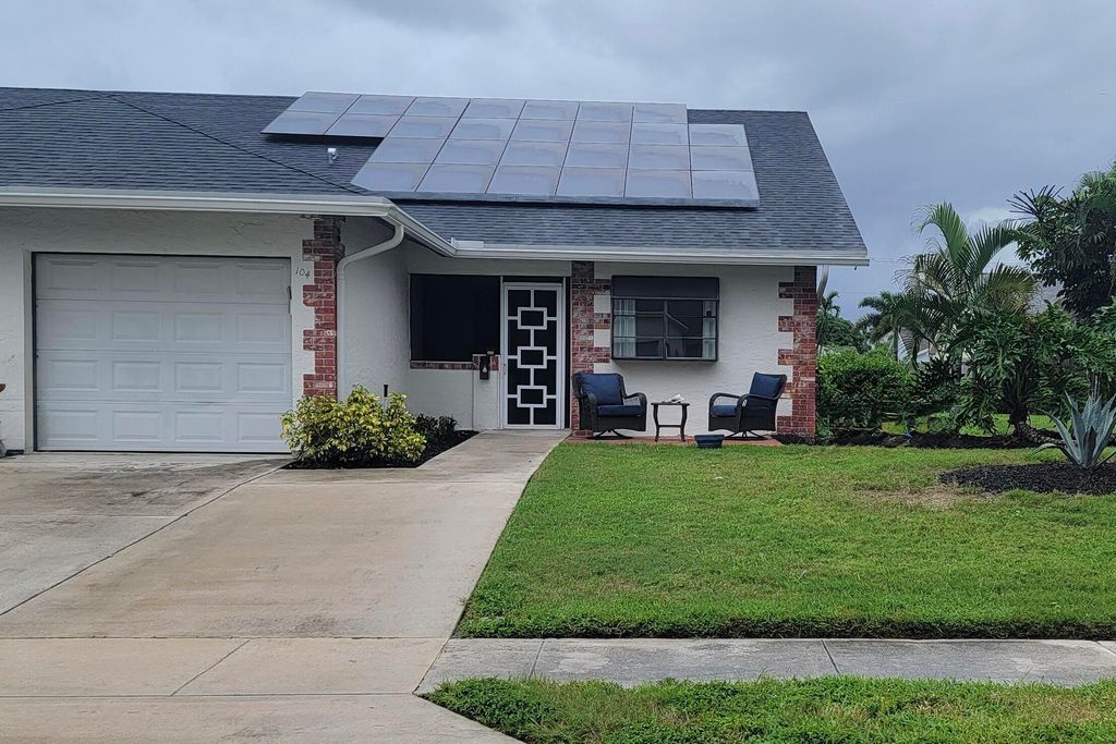 Photo of 104 Arrowhead Circle, Jupiter, FL 33458 (MLS # R11131541)