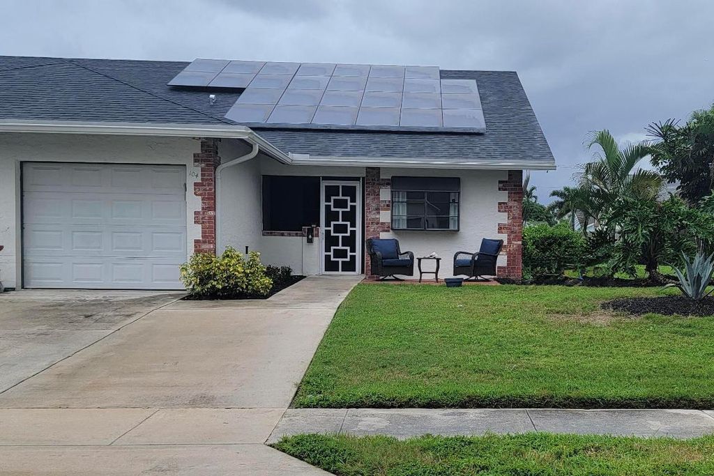 Photo of 104 Arrowhead Circle, Jupiter, FL 33458 (MLS # R11131541)