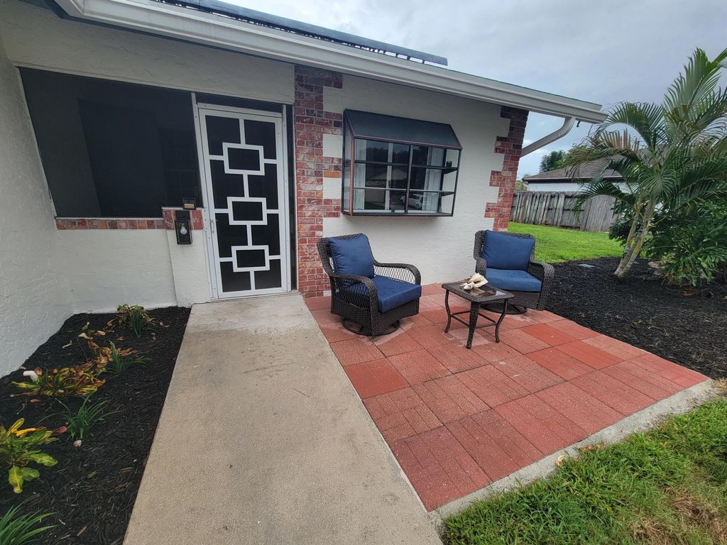 Photo of 104 Arrowhead Circle, Jupiter, FL 33458 (MLS # R11131541)