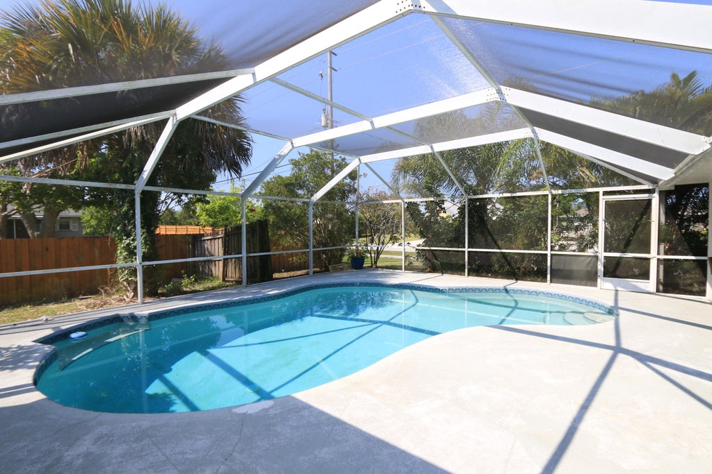 Photo of 786 SW Bond Road Rd, Port St Lucie, FL 34953 (MLS # R10802537)