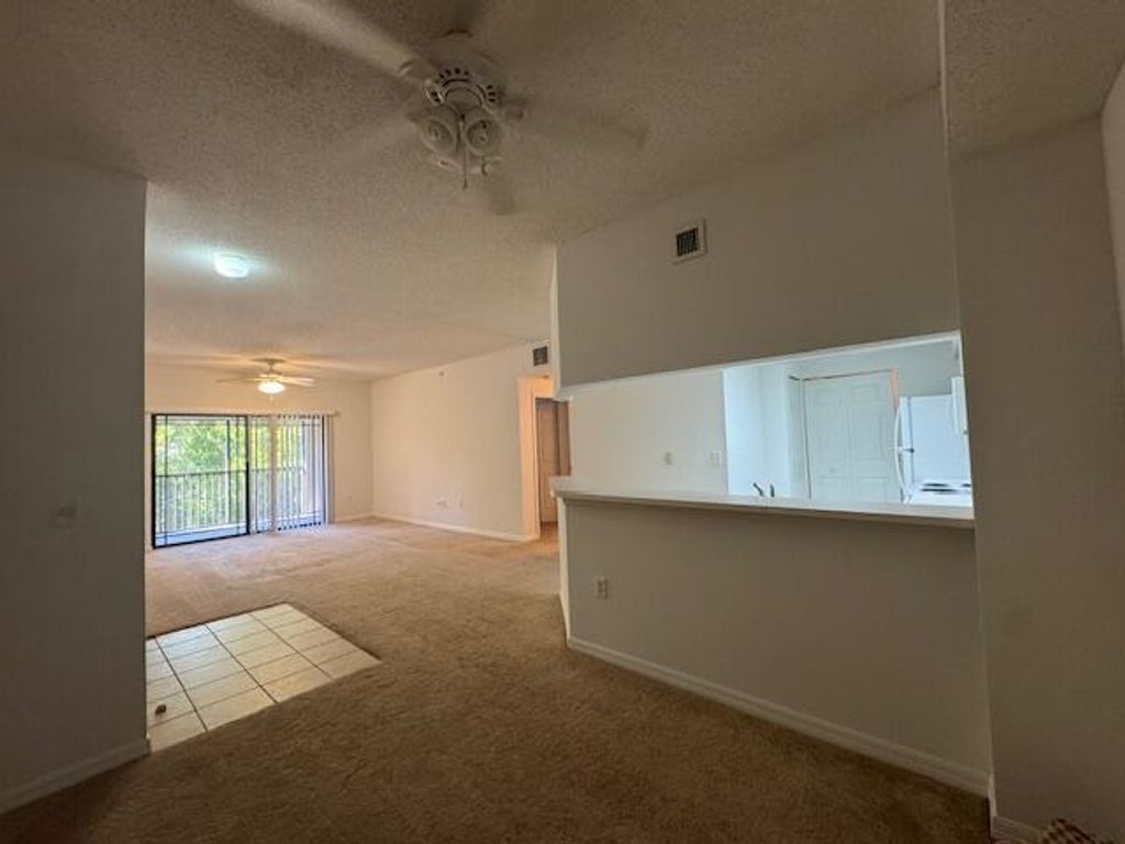 Photo of 3023 Alcazar Place #304, Palm Beach Gardens, FL 33410 (MLS # R11124996)