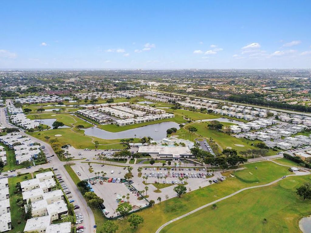 Photo of 98 Capri C Pl #C, Delray Beach, FL 33484 (MLS # B26001455)