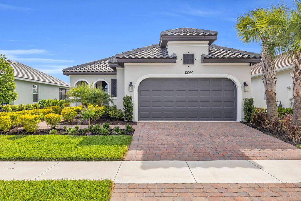 Photo of 10060 SW Santini Road, Port Saint Lucie, FL 34987 (MLS # B26018458)