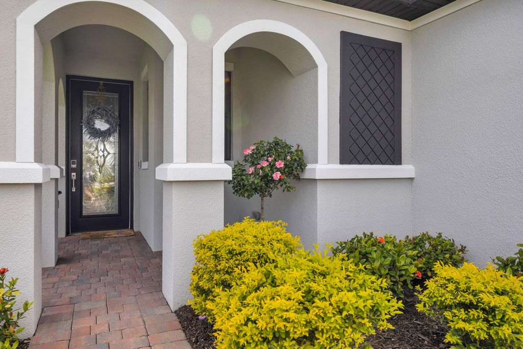 Photo of 10060 SW Santini Road, Port Saint Lucie, FL 34987 (MLS # B26018458)