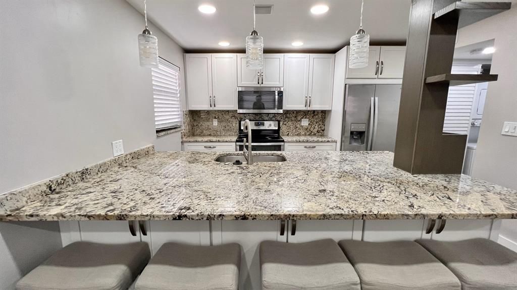 Photo of 9430 Boca Cove Circle #208, Boca Raton, FL 33428 (MLS # R10883559)