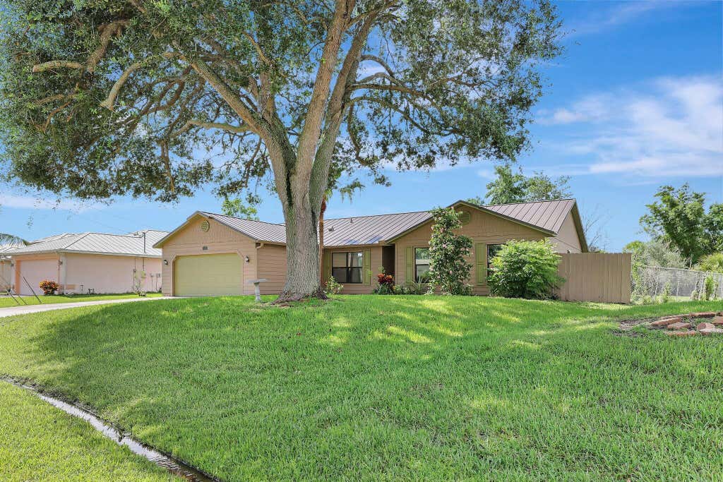 Photo of 2286 SW Jay Avenue, Port Saint Lucie, FL 34953 (MLS # R11010893)