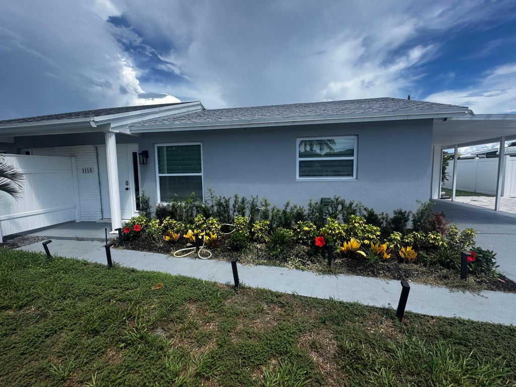Photo of 1115 Stillwater Drive, Jupiter, FL 33458 (MLS # B26071601)