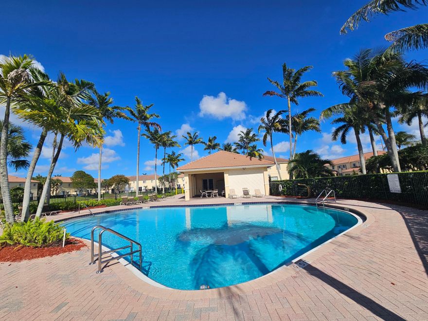 This beautifully maintained 3-bedroom, 2-bathroom villa offers the perfect blend of comfort, style, and serene living. Featuring a spacious one-car garage and an open, light-filled floor plan, this home is designed for both relaxation and everyday convenience. The living and dining areas flow seamlessly, creating an inviting space ideal for entertaining or unwinding at the end of the day. The kitchen is well-appointed with ample cabinetry and counter space, making meal preparation a breeze. The primary suite provides a private retreat with an en-suite bathroom and generous closet space, while the additional bedrooms are perfect for family, guests, or a home office. Step outside to enjoy a peaceful lake view, where you can relax with your morning coffee or take in stunning sunsets.