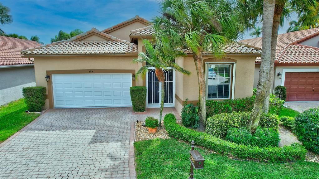 Photo of 6974 Castlemaine Avenue, Boynton Beach, FL 33437 (MLS # R10777118)