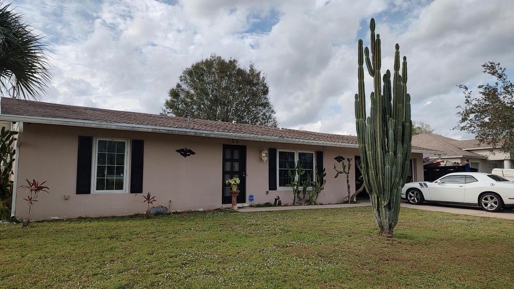 Photo of 128 NW Doreen Street, Port Saint Lucie, FL 34983 (MLS # R10938365)