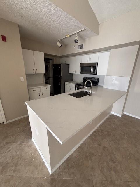 BRAND NEW CALCATTA QUARTZ COUNTERTOPS Modern condo for rent w/ stainless steel appliances, tile flooring, in unit washer and dryer. The unit layout is 2 Master suites with each own bathroom. Balcony w/ spectacular Lake view. Condo Has high vaulted ceiling. Assigned parking spot in front of the building. This condo is located across the street from NOVA University and is welcome for college students or families. Grocery stores and plaza is within 1 mile walking distance. The community offers tennis courts, gym and large pool. Pets are allowed. First Month, Last month and security deposit is required. Water is included in rental price. ON LOCKBOX VIEW BROKER REMARKS