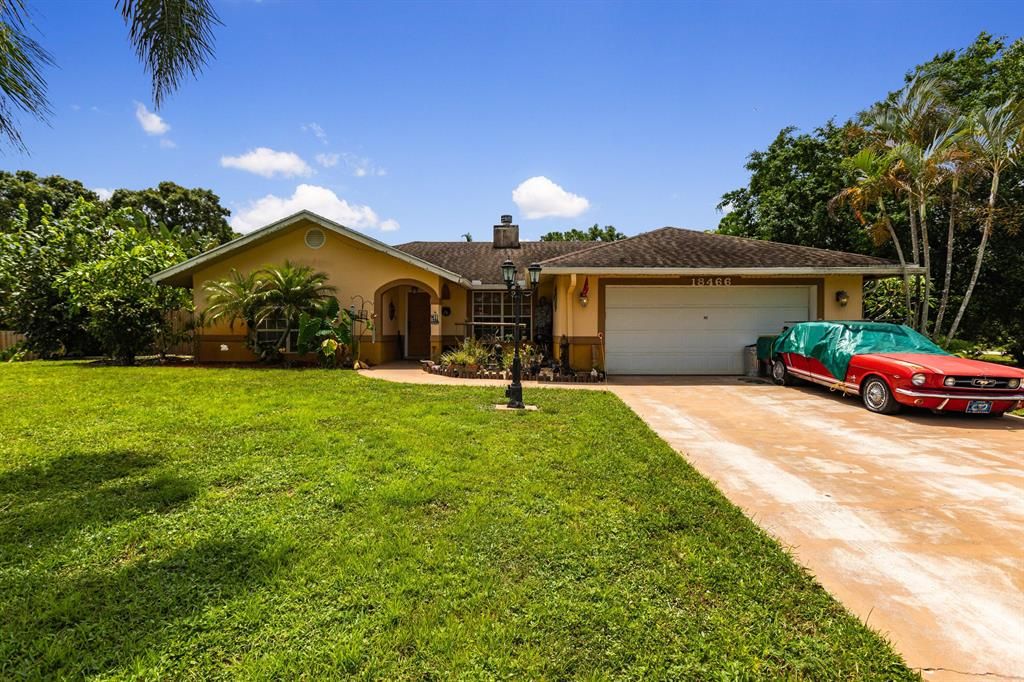 Photo of 18466 47th Court N, Loxahatchee, FL 33470 (MLS # R10727019)