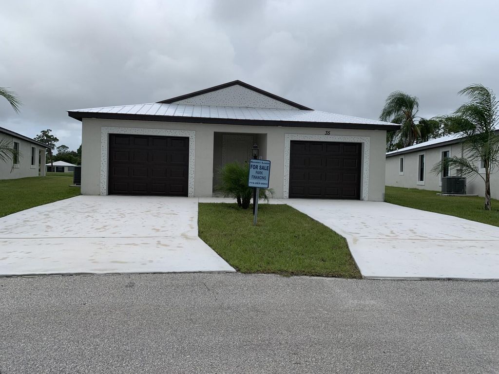 Photo of 35 Lagos Del Norte, Fort Pierce, FL 34951 (MLS # R11131214)