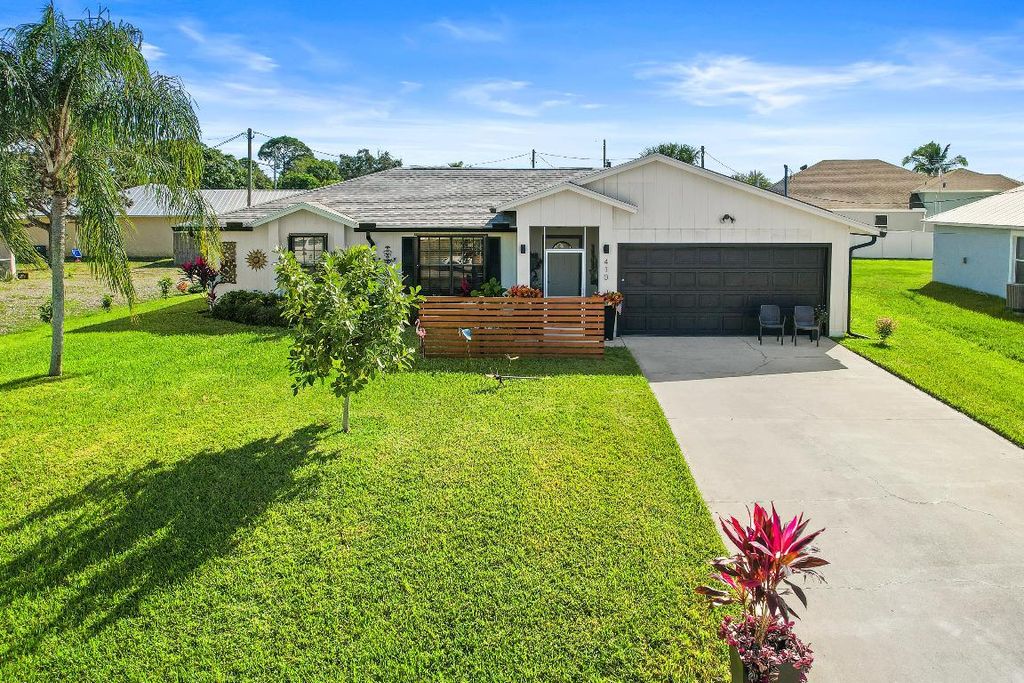 Photo of 410 SW Alcan Drive, Port Saint Lucie, FL 34953 (MLS # R10943151)