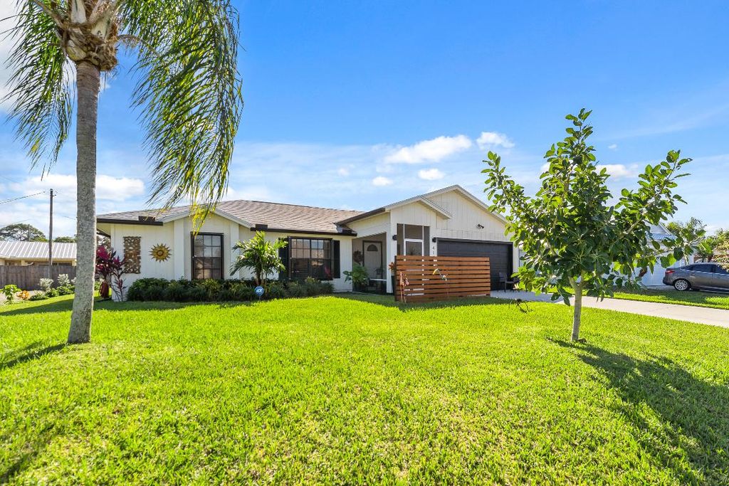 Photo of 410 SW Alcan Drive, Port Saint Lucie, FL 34953 (MLS # R10943151)