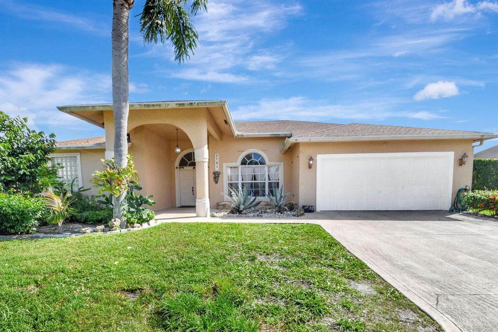 Photo of 1192 W Hatteras Circle W, Greenacres, FL 33413 (MLS # R11002086)