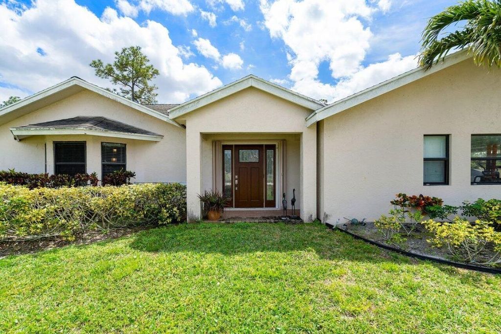 Photo of 14716 82nd Lane N, The Acreage, FL 33470 (MLS # R10972600)