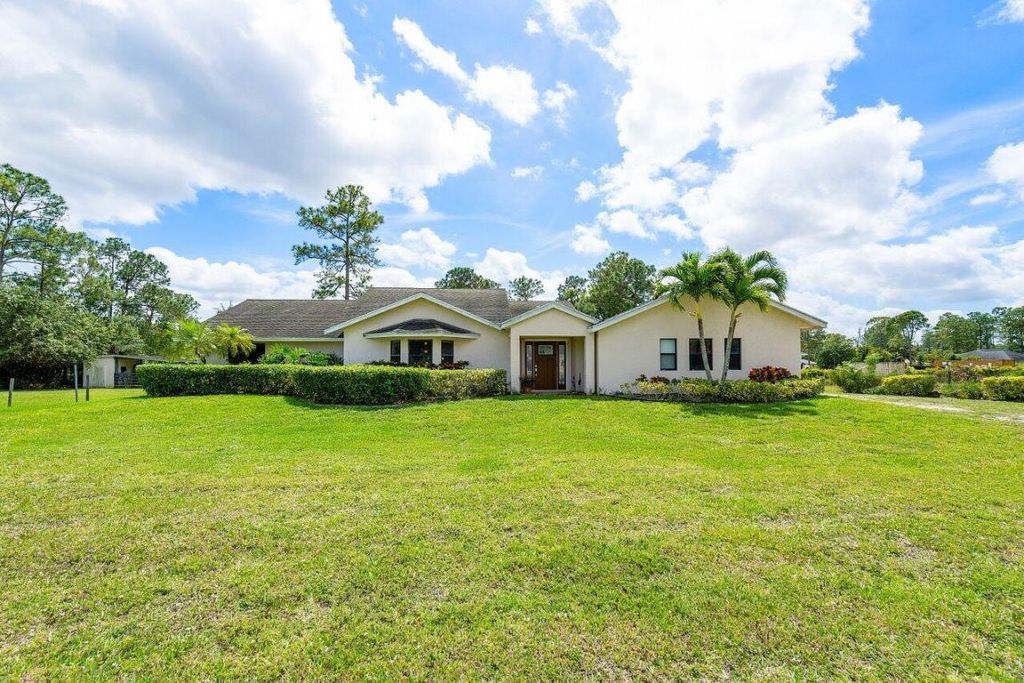 Photo of 14716 82nd Lane N, The Acreage, FL 33470 (MLS # R10972600)