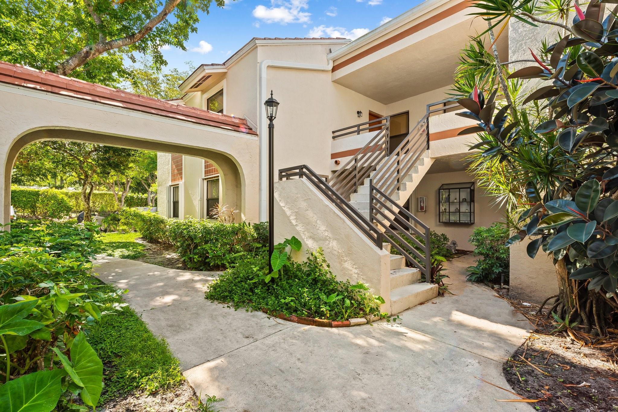 Welcome to this spacious 2 bedroom, 2 bathroom corner unit ideally located in the heart of Plantation’s desirable Central Park. Situated on the 2nd or top floor this open and inviting split-bedroom floor plan offers privacy and functionality. Features include: wood floors throughout, a newly updated kitchen with modern cabinets, pantry, and countertops, plus a new electrical panel and smoke alarms. Enjoy the bright, screened, tiled balcony with a storage room, along with the convenience of a full-size washer and dryer. The primary suite offers a generously sized walk-in closet and an updated bathroom while additional closets throughout provide ample storage. Perfectly positioned near parks, shopping, dining and major roadways this condo combines comfort, convenience, and value in one.