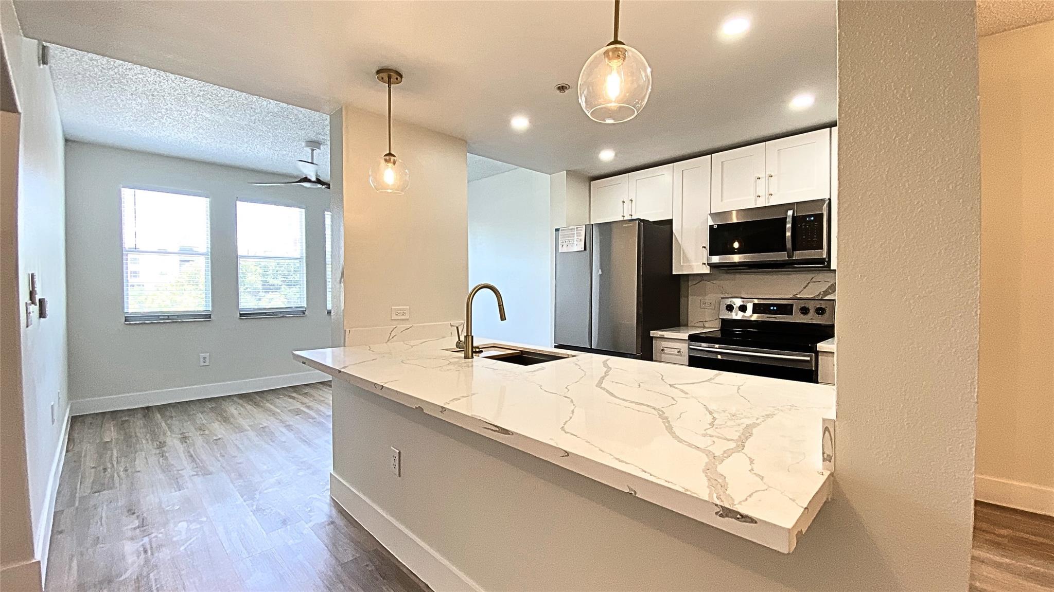 Don’t miss this stunning 1-bedroom, 1-bath condo in the highly sought-after *Solé* building, high-impact windows, an updated kitchen with new quartz countertops, and brand-new 2025 stainless steel appliances, including a 2021 Electric Range and stackable washer/dryer, Newer A/C, new luxury flooring, fresh paint, and a large walk in Closet. Enjoy resort-style amenities such as a heated pool/spa, a well-equipped gym, high-speed internet, secure fob/phone access, a community and billiards room, a rooftop deck, and onsite management. Situated in the heart of downtown Fort Lauderdale, with vibrant nightlife, restaurants, and entertainment. Plus you can rent immediately without waiting