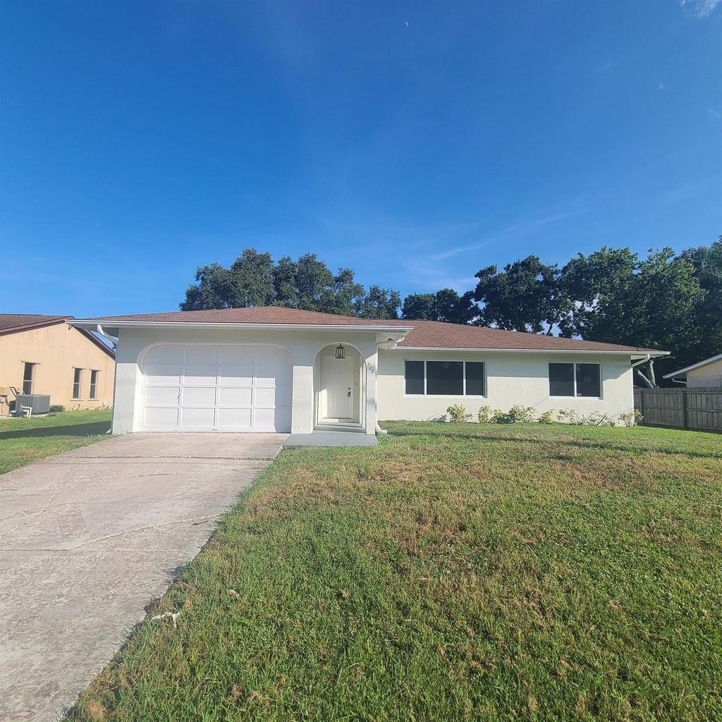 Photo of 528 SE Greenway Terrace, Port Saint Lucie, FL 34983 (MLS # R11112452)