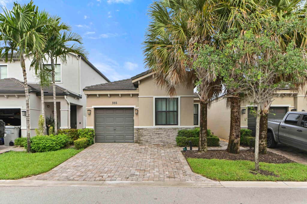 Photo of 355 NW 33RD Lane, Pompano Beach, FL 33069 (MLS # B26061488)