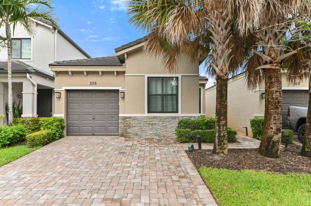 Photo of 355 NW 33RD Lane, Pompano Beach, FL 33069 (MLS # B26061488)