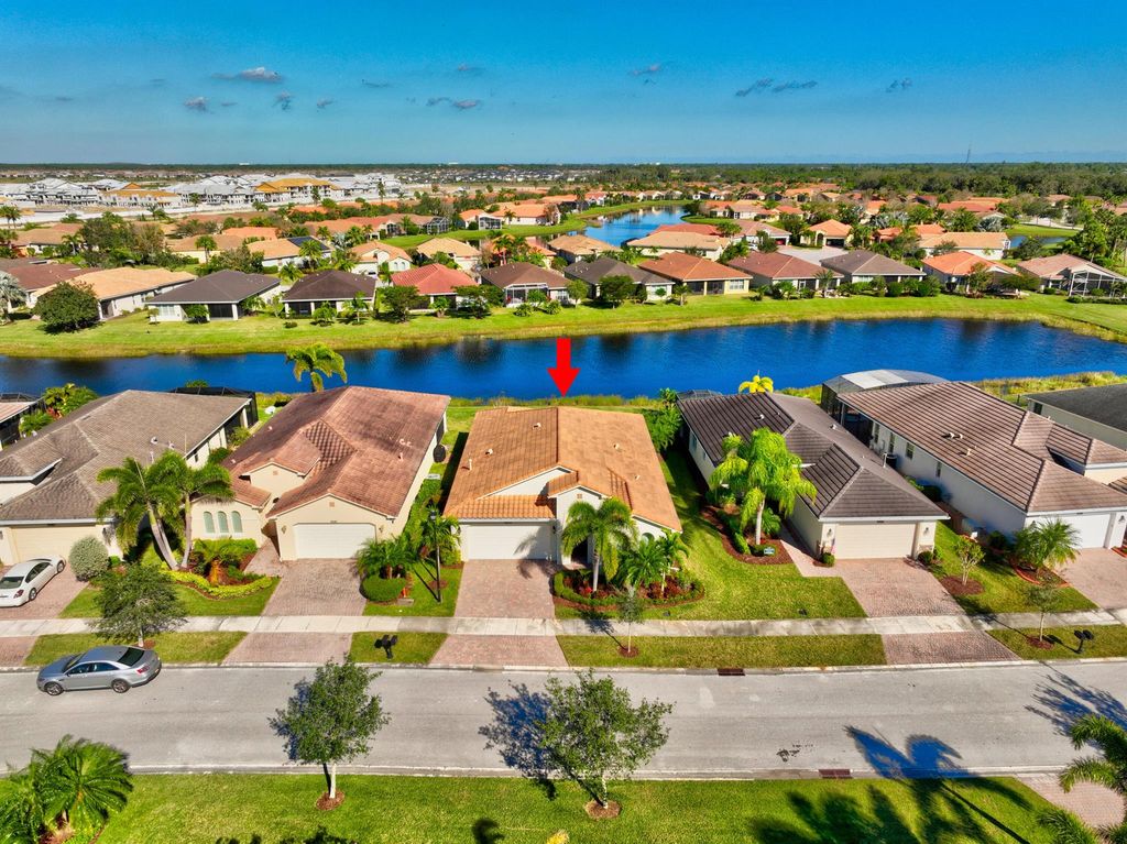 Photo of 9694 SW Royal Poinciana Drive, Port St Lucie, FL 34987 (MLS # R10857424)