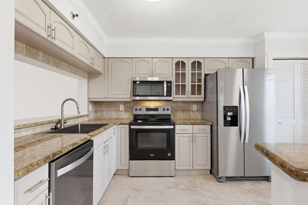 Photo of 2202 S Cypress Bend Drive, Pompano Beach, FL 33069 (MLS # B26015615)