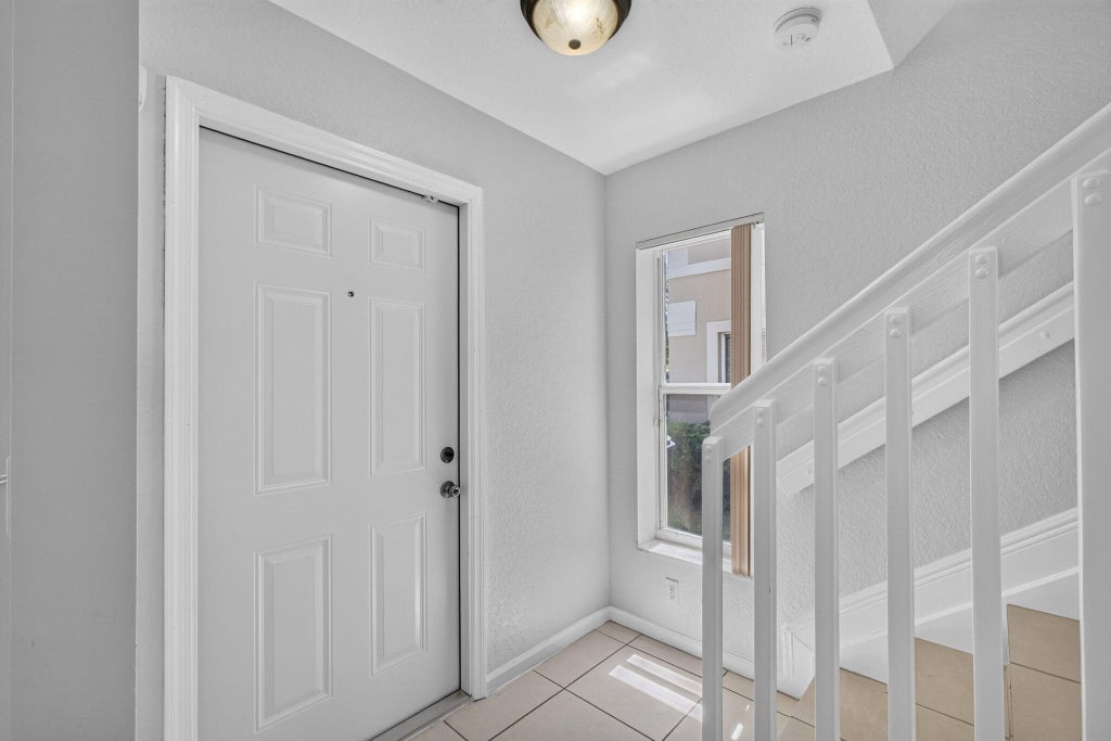 Photo of 946 Summit Lake Drive, West Palm Beach, FL 33406 (MLS # B26044641)