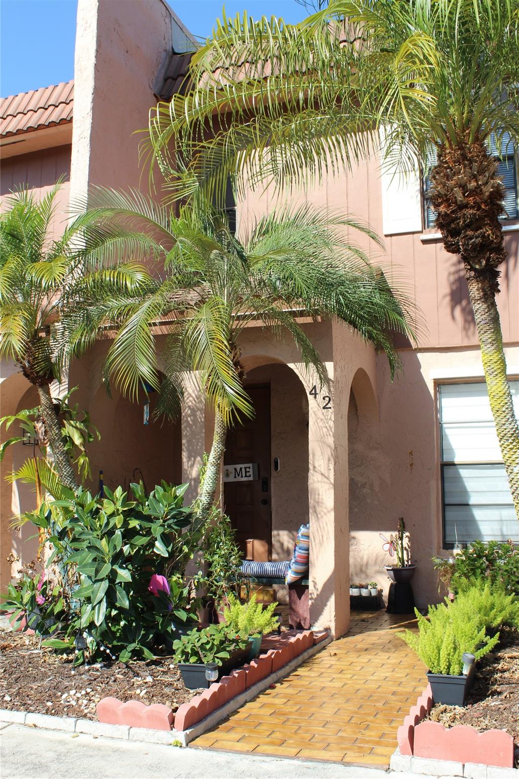 Spacious Townhouse in Central Davie. Desirable Valancia Village is located in and A+ school district with 3 bedrooms and 2.5 updated bathrooms. The partially remodeled eat in kitchen has stainless steel appliances (except stove). Full size washer and dryer. updated electric panel. Nice enclosed and open patios and balcony with garden views. Easy access to all major highways, schools, Restaurants and business centers, community pool, tennis, club house and Basketball court. Perfect for NSU students and Professors. Tenant occupied until July 31st, 2025.