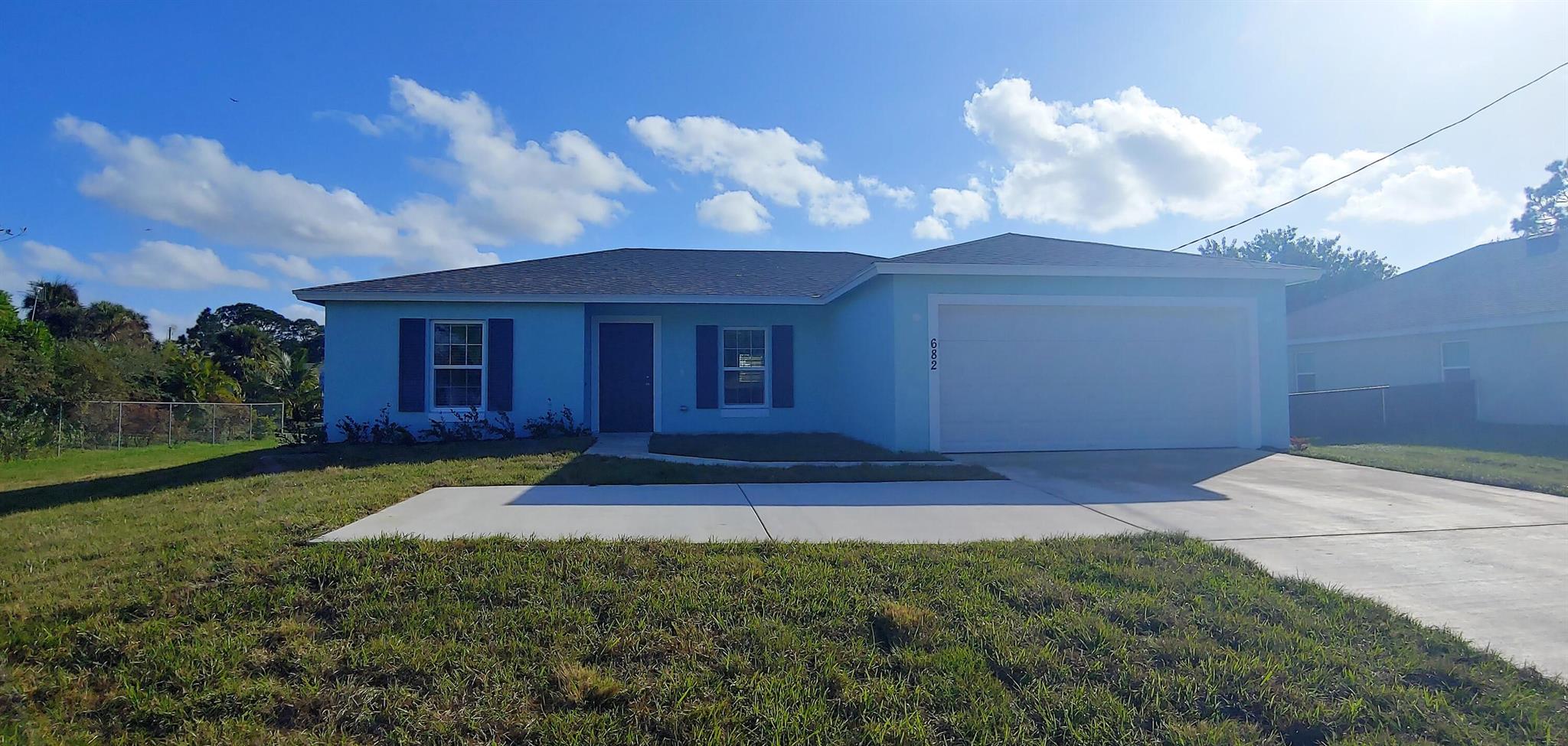 NEWER CONSTRUCTION 3 bedroom, 2 baths with a 2 car garage on an oversized lot. Great location close Tradition area, the i95 and the turnpike. 1 pet allowed with landlord approval. Don't miss out on this great opportunity to call this house your home!