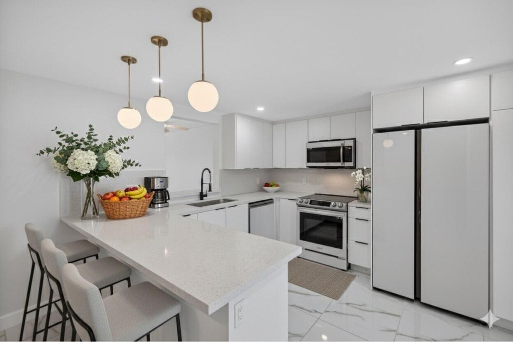 Photo of 14375 Strathmore Lane #303, Delray Beach, FL 33446 (MLS # B26013420)