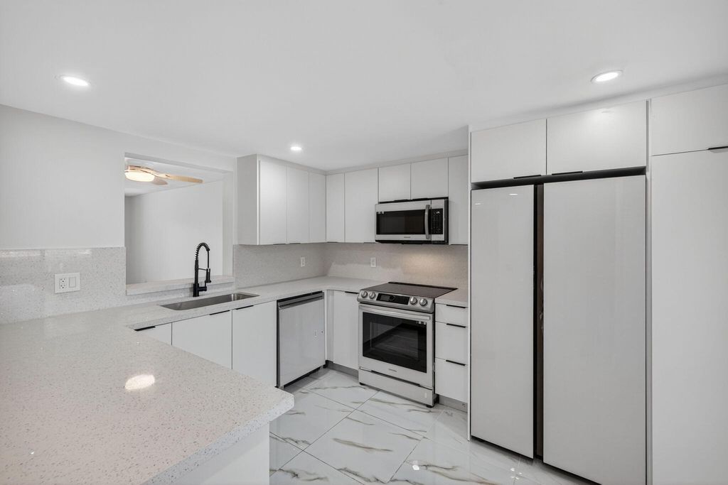 Photo of 14375 Strathmore Lane #303, Delray Beach, FL 33446 (MLS # B26013420)