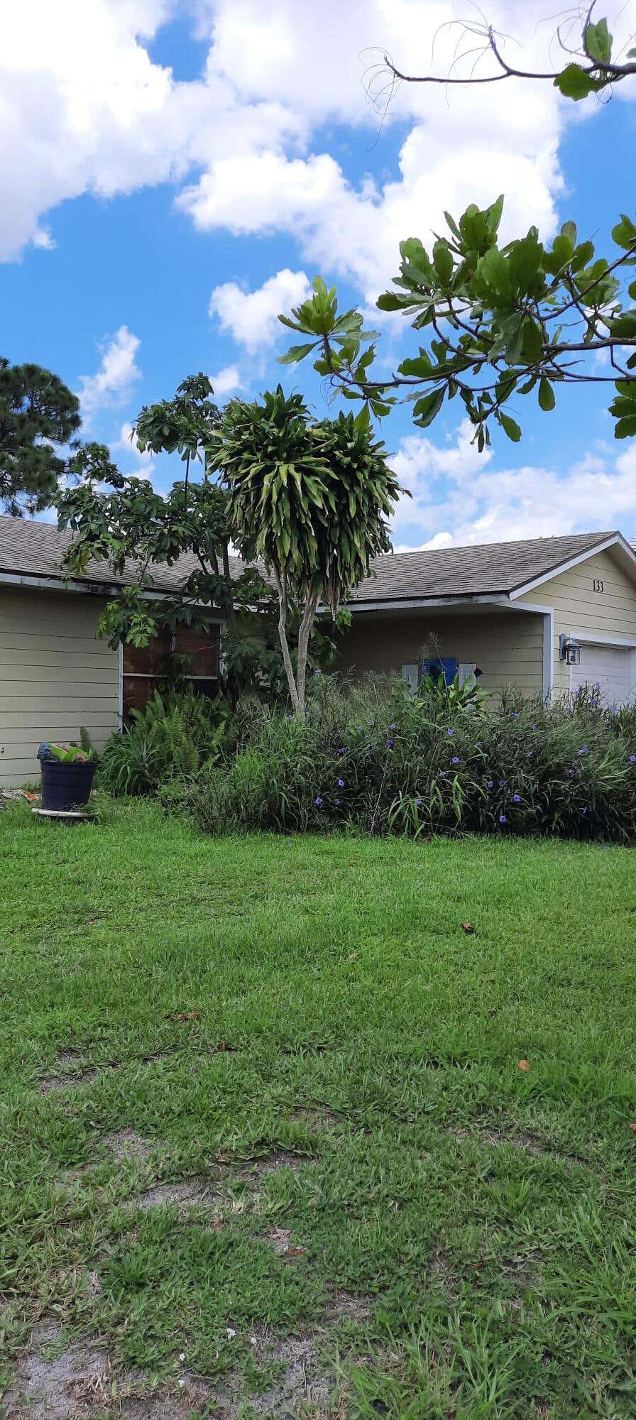Photo of 133 SW Fairway Avenue, Port Saint Lucie, FL 34983 (MLS # R10806583)