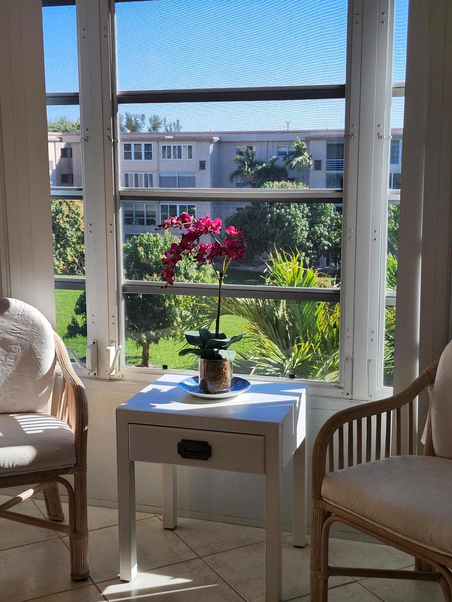 Welcome to your Florida lifestyle in Village Royale on the Green — an active, friendly 55+ community with outstanding amenities and activities. Enjoy 2 pools and hot spas, 2 clubhouses, exercise gym, card room, art room, tennis, pickleball, table tennis, pool tables, shuffleboard and bocce. A huge auditorium features movies, dances, shows, exercise classes and bingo. The beautiful lobby with piano hosts wine & cheese gatherings, karaoke and social get-togethers.  Your penthouse 4th-floor 1BR/1.5BA condo offers ceramic tile throughout and a relaxing Florida room with lovely views. Immaculate en-suite bedroom with a huge walk-in closet plus wall closet. Updated shower, vanity and extra storage. Tastefully furnished living/dining room and eat-in kitchen. Light, bright, spacious - MUST SEE!