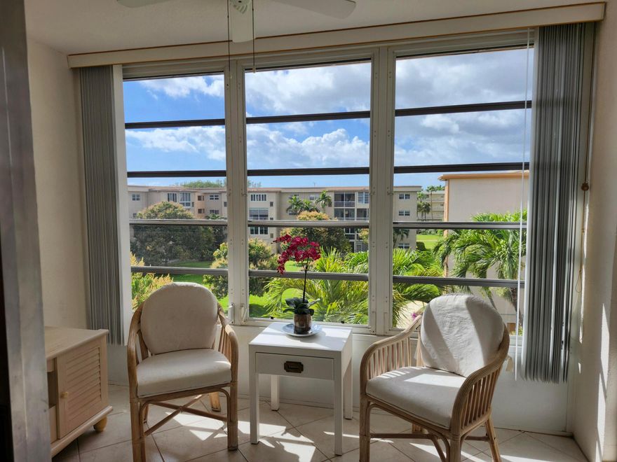 Welcome to your Florida lifestyle in Village Royale on the Green — an active, friendly 55+ community with outstanding amenities and activities. Enjoy 2 pools and hot spas, 2 clubhouses, exercise gym, card room, art room, tennis, pickleball, table tennis, pool tables, shuffleboard and bocce. A huge auditorium features movies, dances, shows, exercise classes and bingo. The beautiful lobby with piano hosts wine & cheese gatherings, karaoke and social get-togethers.  Your penthouse 4th-floor 1BR/1.5BA condo offers ceramic tile throughout and a relaxing Florida room with lovely views. Immaculate en-suite bedroom with a huge walk-in closet plus wall closet. Updated shower, vanity and extra storage. Tastefully furnished living/dining room and eat-in kitchen. Light, bright, spacious - MUST SEE!