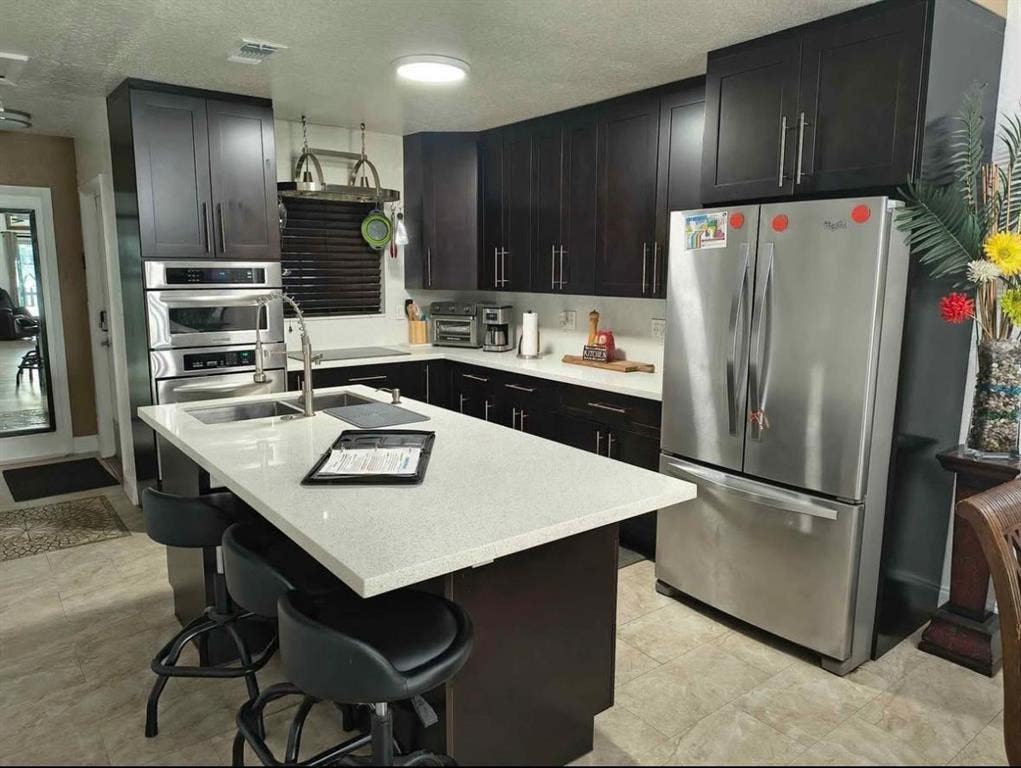 Photo of 5741 SW 24th Avenue #A, Fort Lauderdale, FL 33312 (MLS # B26039554)