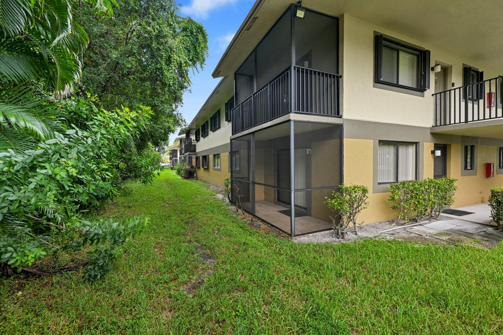 Photo of 522 Trace Circle #102, Deerfield Beach, FL 33441 (MLS # B26060126)