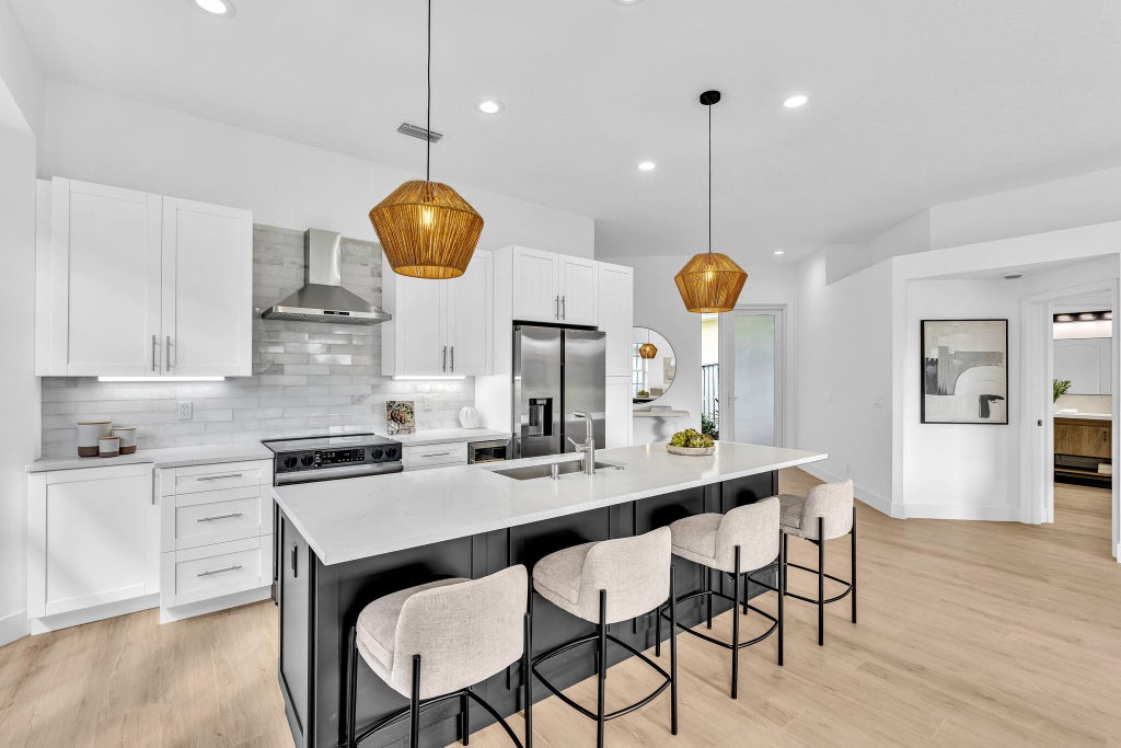Photo of 629 Masters Way, Palm Beach Gardens, FL 33418 (MLS # B26080731)