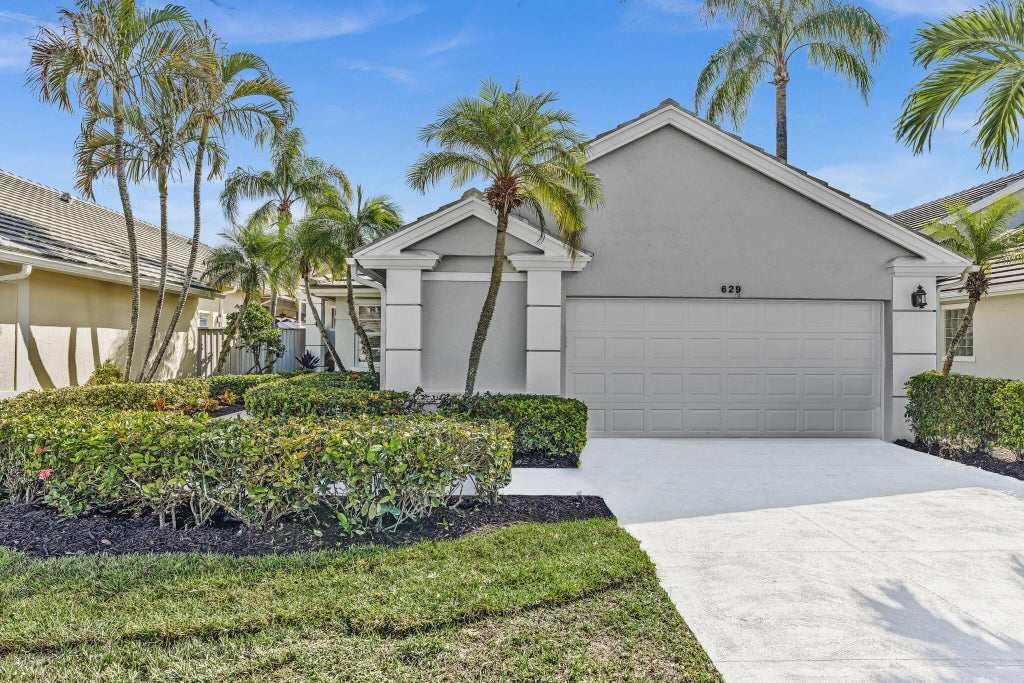 Photo of 629 Masters Way, Palm Beach Gardens, FL 33418 (MLS # B26080731)