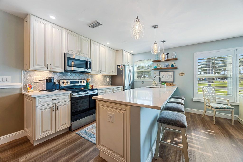 Photo of 215 N High Point Boulevard #B, Boynton Beach, FL 33435 (MLS # R11145707)