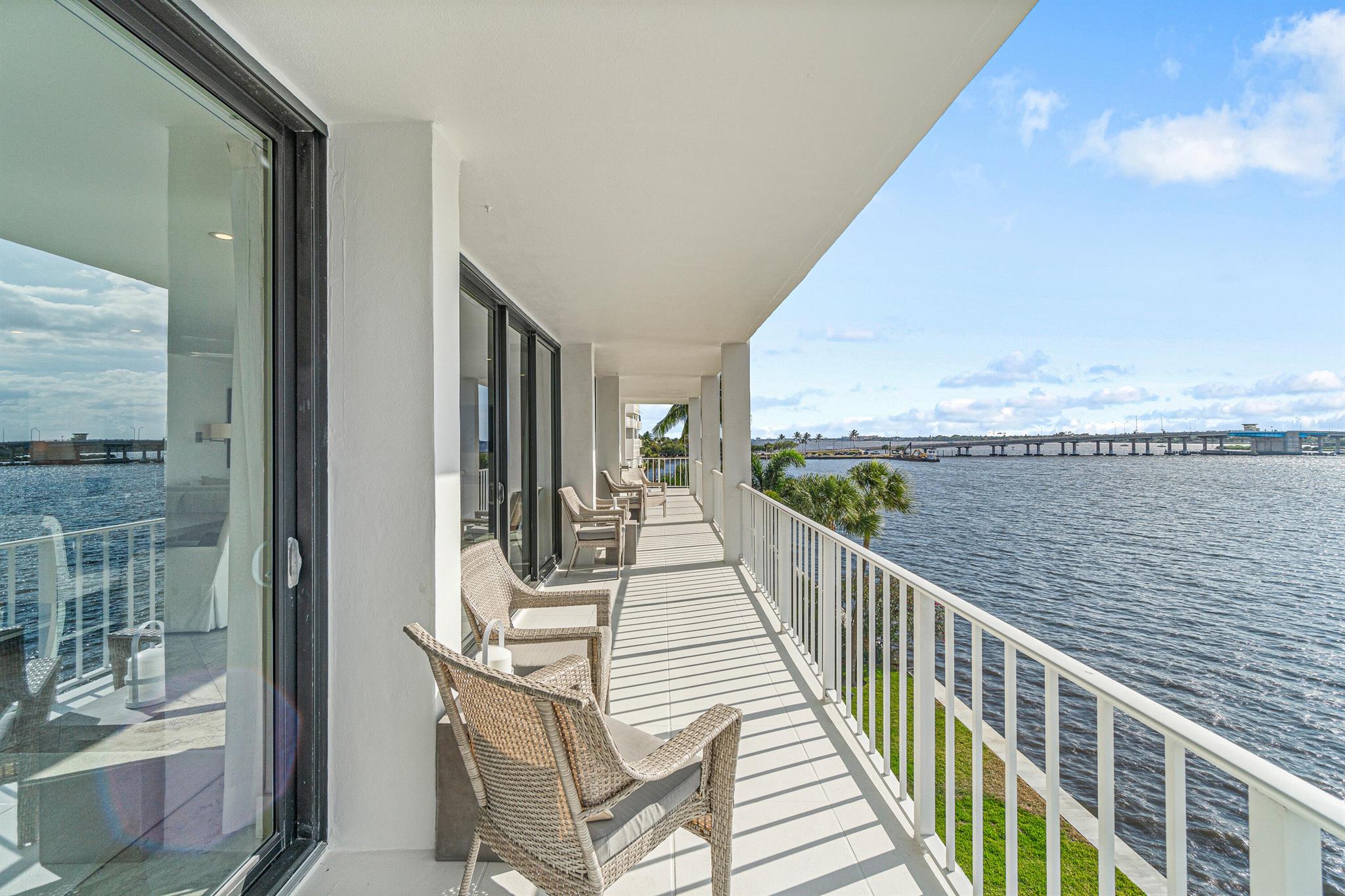 Spectacular Direct Intracoastal views from all rooms in this 3BR/2.1BA apartment in the Cove. Total renovation in light tones with an open kitchen, custom cabinetry, and luxurious baths. Sun filled west and south location with floor to ceiling hurricane doors leading to the large wrap around terrace to relax and enjoy the sunsets and boats. Designer furnishings, fitted closets and electric shades are added features to this wonderful apartment. Poolside cabana included. The Cove has a pool area designed by Mario Nievera, new fitness center, community room lobby. Doorperson A deeded beach path is next to the Four Seasons Resort just across A1A. Short drive to Palm Beach Par 3 Golf Course, Palm Beach Tennis Center, fine dining, shopping and cultural centers. Resort living at its bes