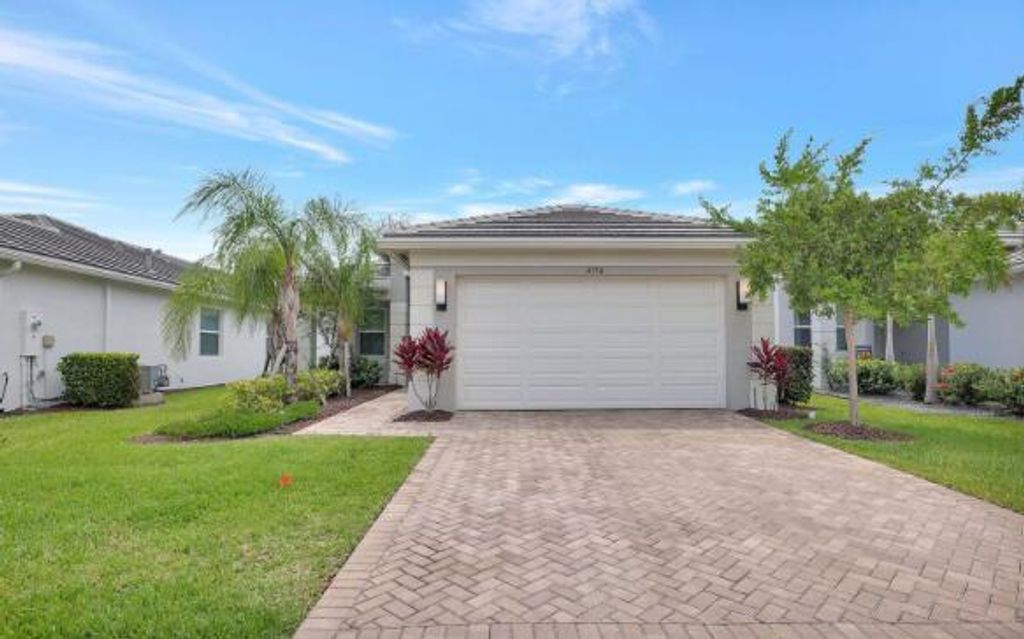 Photo of 11750 SW Lagoon Lane, Port Saint Lucie, FL 34987 (MLS # R11066633)