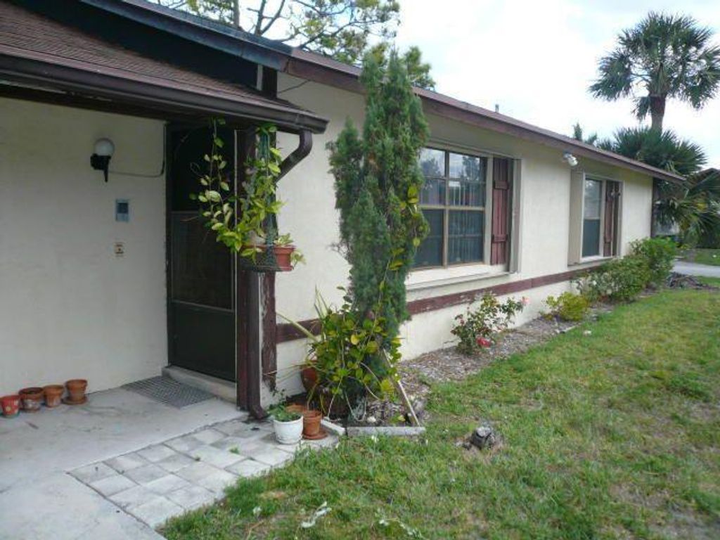Photo of 471 Glenwood Drive, West Palm Beach, FL 33415 (MLS # R10700866)