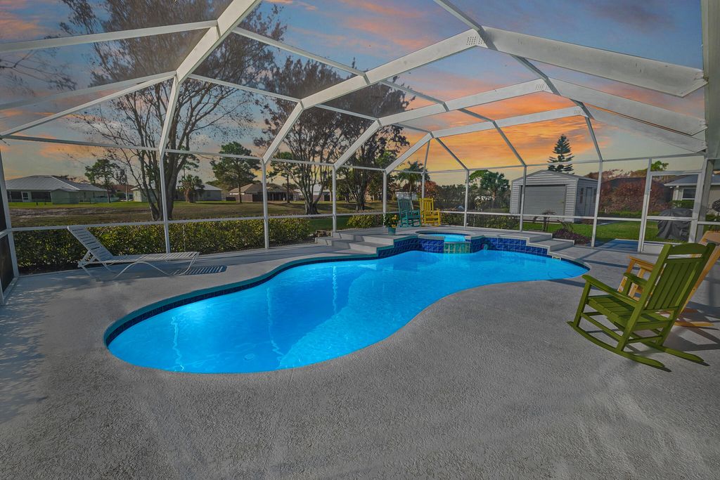 Photo of 5944 NW Favian Avenue, Port Saint Lucie, FL 34986 (MLS # B26001230)