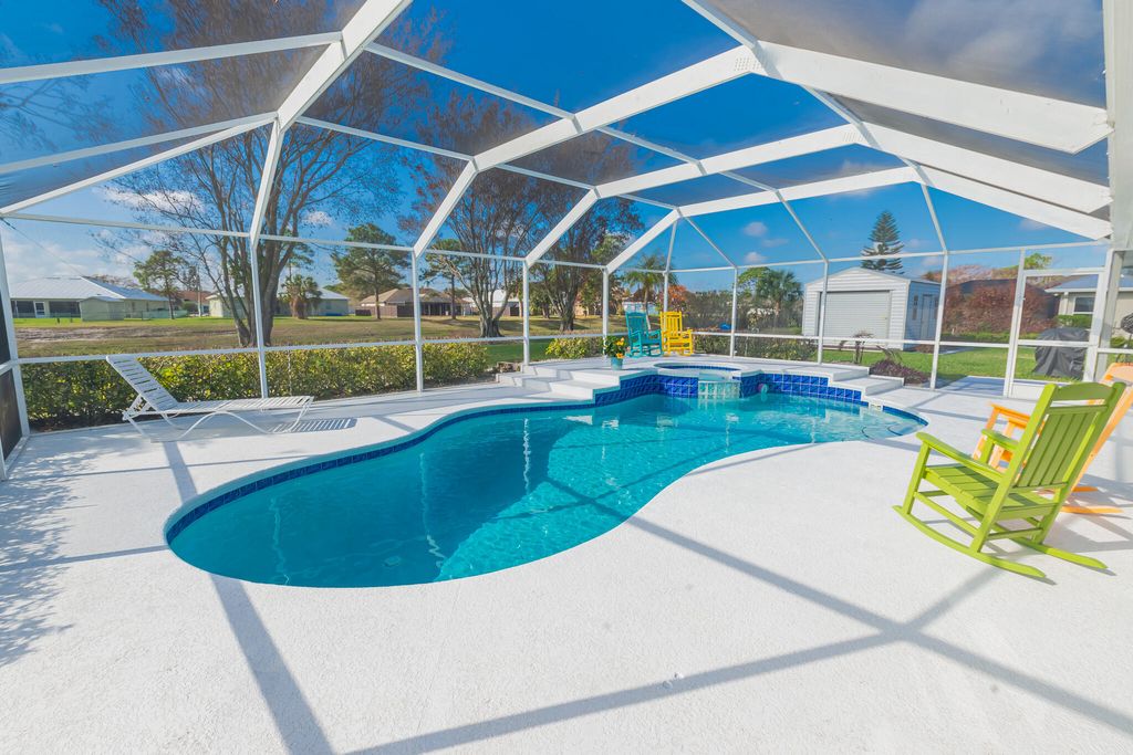 Photo of 5944 NW Favian Avenue, Port Saint Lucie, FL 34986 (MLS # B26001230)