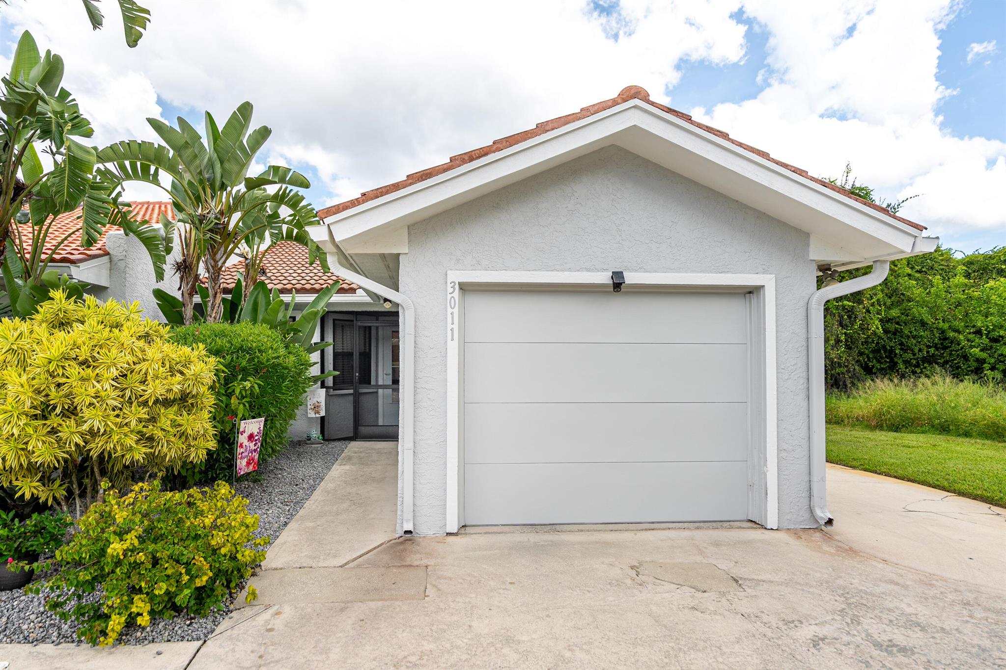 Rare opportunity to own in Norseman's Harbour, an exclusive gated community located within Vikings Lookout. This spacious 2 bedroom, 2 bathroom End Unit Villa offers direct ocean access with no fixed bridges and comes with its own private boat slip with a ''High Tide' 9000 lb capacity 'Cuda'' model boat lift. Views of the St. Lucie River from your screened-in patio and relax knowing you're in one of the most private communities on the water. With only a 15 min. ride to the ocean.The home offers a private garage, a screened-in outdoor space ideal for morning coffee or evening sunsets, and is ideally located near the future riverfront dining and shopping area. Don't miss this rare chance to experience true Florida waterfront living in one of the Treasure Coast's most desirable locat