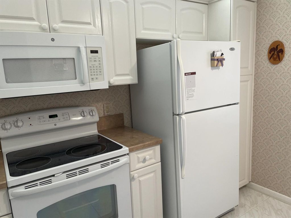 Photo of 6178 Pointe Regal Circle, Delray Beach, FL 33484 (MLS # R10937251)